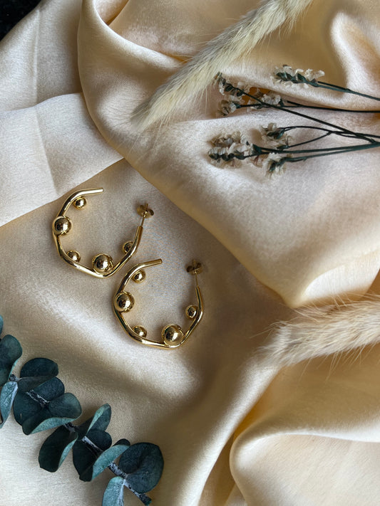 Golden bead Dangler Earrings